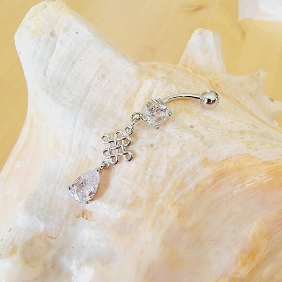 14G dangle belly button ring with decorative celtic shape charm in clear CZ - Picture 3 of 5